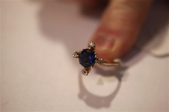 A gold, sapphire and diamond ring, size N.